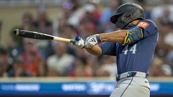 Seattle Mariners outfielder Julio Rodriguez hits a go-ahead sacrifice fly against the Minnesota Twins on June 24 at Target Field. Seattle Mariners outfielder Julio Rodriguez hits a go-ahead sacrifice fly against the Minnesota Twins on June 24 at Target Field.