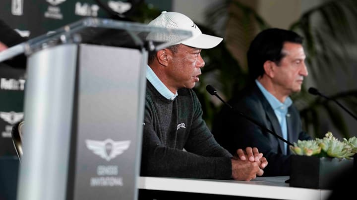 Tiger Woods, pictured Tuesday with Genesis president and CEO José Muñoz, said it's possible that the tournament could be played later in the year in a reimagined PGA Tour schedule.