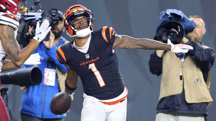Sep 23, 2024; Cincinnati, Ohio, USA; Cincinnati Bengals wide receiver Ja'Marr Chase (1) celebrates after his touchdown during the fourth quarter against the Washington Commanders at Paycor Stadium.
