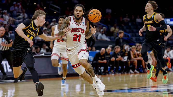 Mar 19, 2026; Oklahoma City, OK, USA; Houston Cougars guard Emanuel Sharp (21) dribbles the ball during a first round game of the men's 2026 NCAA Tournament at Paycom Center. Mandatory Credit: Alonzo Adams-Imagn Images