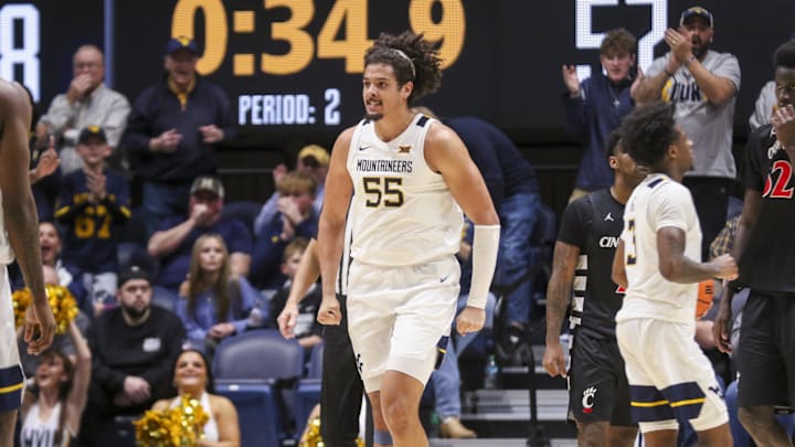 Jan 6, 2026; Morgantown, West Virginia, USA; West Virginia Mountaineers center Harlan Obioha (55) celebrates during the second half against the Cincinnati Bearcats at Hope Coliseum.