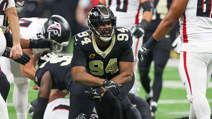 Nov 23, 2025; New Orleans, Louisiana, USA; New Orleans Saints defensive end Cameron Jordan (94) reacts after forcing a fumble against the Atlanta Falcons during the first half at Caesars Superdome. Mandatory Credit: Stephen Lew-Imagn Images