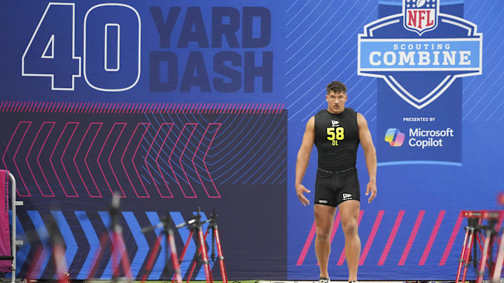 Feb 26, 2026; Indianapolis, IN, USA; Wisconsin defensive lineman Mason Reiger (DL58) prepares to run the 40-yard dash during the NFL Scouting Combine at Lucas Oil Stadium. Mandatory Credit: Kirby Lee-Imagn Images Feb 26, 2026; Indianapolis, IN, USA; Wisconsin defensive lineman Mason Reiger (DL58) prepares to run the 40-yard dash during the NFL Scouting Combine at Lucas Oil Stadium. Mandatory Credit: Kirby Lee-Imagn Images