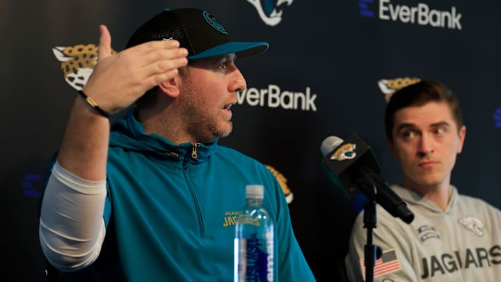 Jacksonville Jaguars head coach Liam Coen, left, speaks during a press conference next to general manager James Gladstone at Miller Electric Center Tuesday, April 15, 2025 in Jacksonville, Fla. [Corey Perrine/Florida Times-Union]