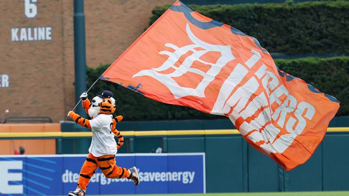 Detroit Tigers mascot Paws celebrates after victory. 