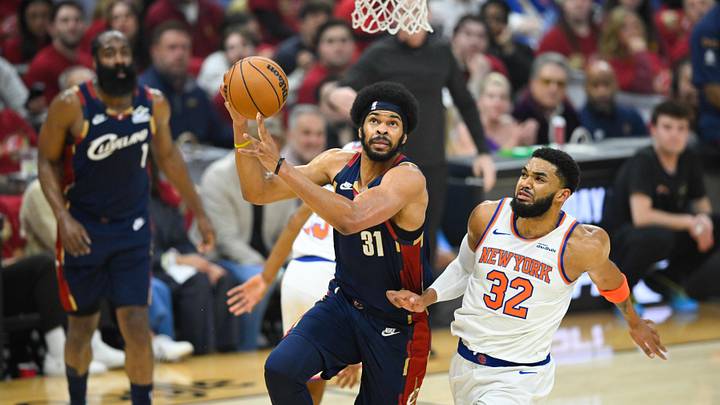 May 23, 2026; Cleveland, Ohio, USA; Cleveland Cavaliers center Jarrett Allen (31) shoots while defended by New York Knicks center Karl-Anthony Towns (32) in the first quarter during game three of the eastern conference finals for the 2026 NBA playoffs at Rocket Arena. Mandatory Credit: David Richard-Imagn Images