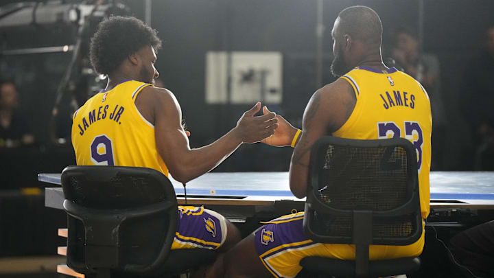 Sep 30, 2024; El Segundo, CA, USA; Los Angeles Lakers forward LeBron James (23) with son Bronny James (9) during media day at the UCLA Health Training Center. Mandatory Credit: Kirby Lee-Imagn Images