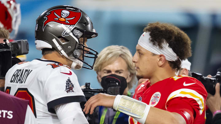 Feb 7, 2021; Tampa, FL, USA;  Tampa Bay Buccaneers quarterback Tom Brady (left) greets Kansas City Chiefs quarterback Patrick Mahomes following Super Bowl LV at Raymond James Stadium.  Mandatory Credit: Mark J. Rebilas-Imagn Images
