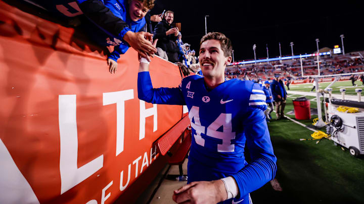 BYU kicker Will Ferrin celebrates with fans after making game-winning kick against Utah BYU kicker Will Ferrin celebrates with fans after making game-winning kick against Utah