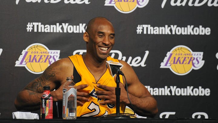 April 13, 2016; Los Angeles, CA, USA; Los Angeles Lakers  forward Kobe Bryant (24) speaks to media following the 101-96 victory against the Utah Jazz at Staples Center. Mandatory Credit: Gary A. Vasquez-Imagn Images