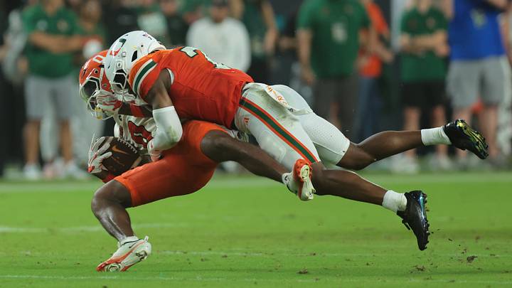 Sep 10, 2026; Miami Gardens, Florida, USA; Miami Hurricanes defensive back Zechariah Poyser (7) tackles Florida A&M Rattlers wide receiver Corey Petty (0) in the firsTexas Rangers half at Hard Rock Stadium. Mandatory Credit: Sam Navarro-Imagn Images Sep 10, 2026; Miami Gardens, Florida, USA; Miami Hurricanes defensive back Zechariah Poyser (7) tackles Florida A&M Rattlers wide receiver Corey Petty (0) in the firsTexas Rangers half at Hard Rock Stadium. Mandatory Credit: Sam Navarro-Imagn Images