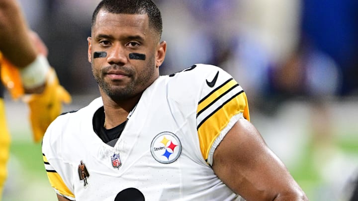 Pittsburgh Steelers quarterback Russell Wilson (3) stretches for warm ups before the game against the Indianapolis Colts at Lucas Oil Stadium.