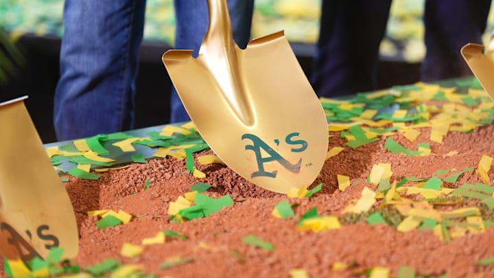 Gold shovel with Athletics on it in the dirt as the team's ceremonial groundbreaking in Las Vegas