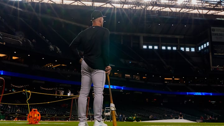 Aug 8, 2025; Phoenix, Arizona, USA; Colorado Rockies interim manager Warren Schaeffer (32) watches on from the infield as he team warms up for a game against the Arizona Diamondbacks at Chase Field. Aug 8, 2025; Phoenix, Arizona, USA; Colorado Rockies interim manager Warren Schaeffer (32) watches on from the infield as he team warms up for a game against the Arizona Diamondbacks at Chase Field.