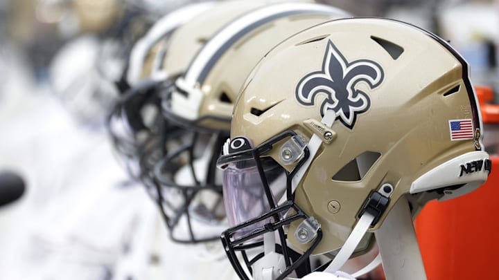 Oct 10, 2021; Landover, Maryland, USA; New Orleans Saints players' helmets on the bench against the Washington Football Team at FedExField. Mandatory Credit: Geoff Burke-Imagn Images Oct 10, 2021; Landover, Maryland, USA; New Orleans Saints players' helmets on the bench against the Washington Football Team at FedExField. Mandatory Credit: Geoff Burke-Imagn Images