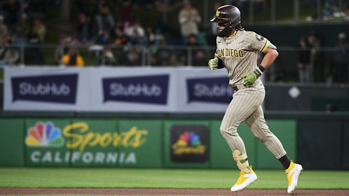 Apr 7, 2025; West Sacramento, California, USA; San Diego Padres outfielder Fernando Tatis Jr. (23) rounds the bases after hitting a home run against the Athletics during the sixth inning at Sutter Health Park. Mandatory Credit: Ed Szczepanski-Imagn Images