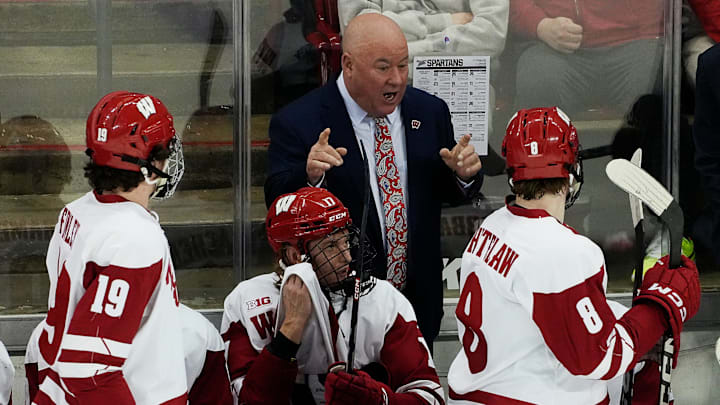 Wisconsin Head Coach Mike Hastings speaks to forward William Whitelaw (8) during the second period of the match against Michigan St. on Saturday March 2, 2024 at the Kohl Center in Madison, Wis.