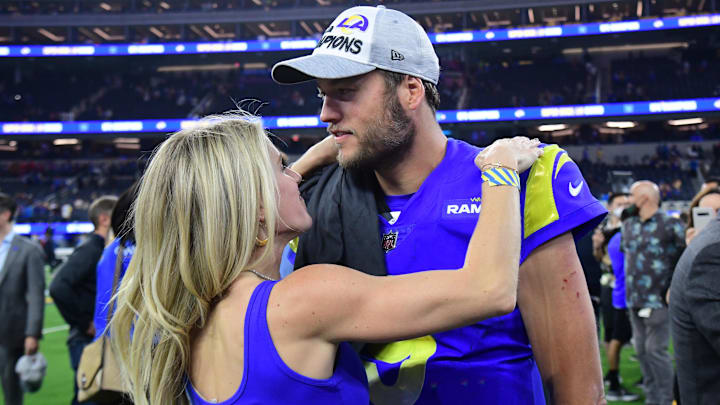 Los Angeles Rams quarterback Matthew Stafford (9) with wife Kelly after defeating the San Francisco 49ers in the NFC Championship Game at SoFi Stadium. Los Angeles Rams quarterback Matthew Stafford (9) with wife Kelly after defeating the San Francisco 49ers in the NFC Championship Game at SoFi Stadium.