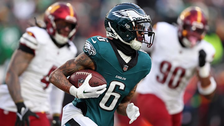 Philadelphia Eagles wide receiver DeVonta Smith (6) runs with the ball against the Washington Commanders during the first half in the NFC Championship game at Lincoln Financial Field.