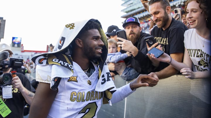 Oct 19, 2024; Tucson, Arizona, USA; Colorado Buffalos quarterback Shedeur Sanders (2) greets fans after defeating the Arizona Wildcats at Arizona Stadium.