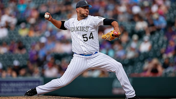 Jun 19, 2022; Denver, Colorado, USA; Colorado Rockies relief pitcher Carlos Estevez (54) pitches in