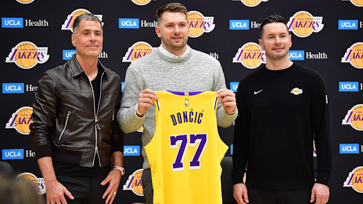 Feb 4, 2025; El Segundo, CA, USA; Los Angeles Lakers guard Luka Doncic poses for photos with general manager Rob Pelinka and head coach JJ Redick at UCLA Health Training Center. Mandatory Credit: Gary A. Vasquez-Imagn Images Feb 4, 2025; El Segundo, CA, USA; Los Angeles Lakers guard Luka Doncic poses for photos with general manager Rob Pelinka and head coach JJ Redick at UCLA Health Training Center. Mandatory Credit: Gary A. Vasquez-Imagn Images