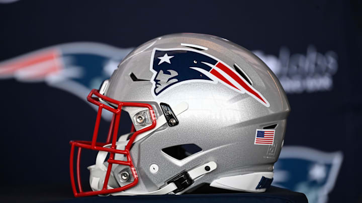 Jan 17, 2024; Foxborough, MA, USA; A New England Patriots helmet sits on a table prior to a press conference at Gillette Stadium. Mandatory Credit: Eric Canha-Imagn Images
