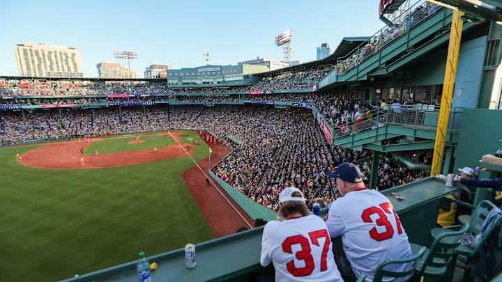 Saturday, June 8, 2024; Boston MA-Fans watch the game from the top of the Green Monster during the Savannah Bananas first Banana Ball game at Fenway Park on Saturday, June 8, 2024.