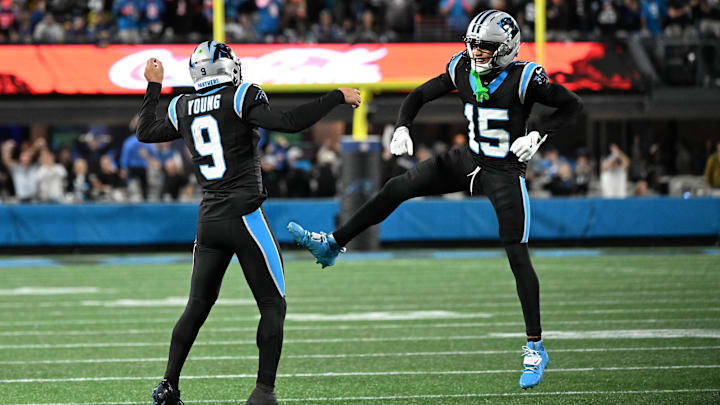 Jan 10, 2026; Charlotte, NC, USA; Carolina Panthers quarterback Bryce Young (9) and wide receiver Jimmy Horn Jr. (15) reacts in the fourth quarter in an NFC Wild Card Round game at Bank of America Stadium. Mandatory Credit: Bob Donnan-Imagn Images