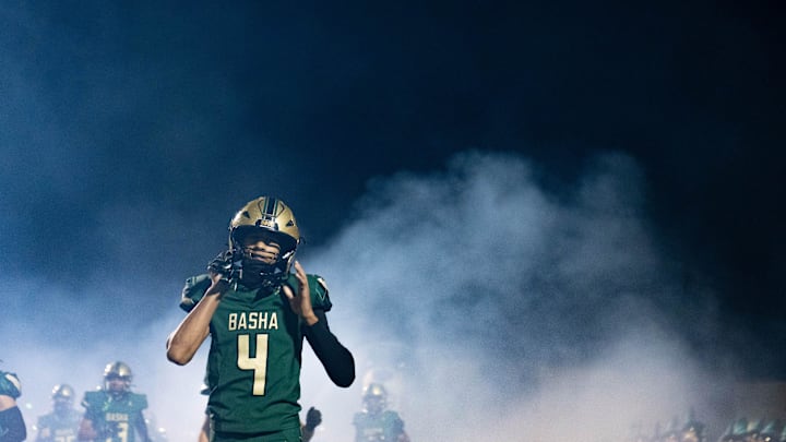 Basha Bears Kash Brock (4) runs onto the field before a game against the Hamilton Huskies at Basha High School in Chandler on Oct. 24, 2025.