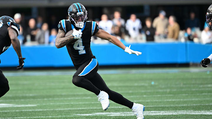 Dec 21, 2025; Charlotte, North Carolina, USA; Carolina Panthers wide receiver Tetairoa McMillan (4) with the ball in the third quarter at Bank of America Stadium. Mandatory Credit: Bob Donnan-Imagn Images Dec 21, 2025; Charlotte, North Carolina, USA; Carolina Panthers wide receiver Tetairoa McMillan (4) with the ball in the third quarter at Bank of America Stadium. Mandatory Credit: Bob Donnan-Imagn Images