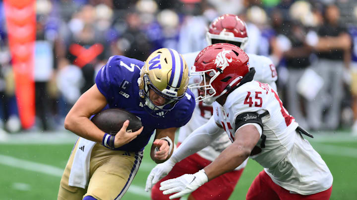 Sep 14, 2024; Seattle, Washington, USA; Washington State Cougars edge Raam Stevenson (45) sacks Washington Huskies quarterback Will Rogers (7) during the second half at Lumen Field. Mandatory Credit: Steven Bisig-Imagn Images Sep 14, 2024; Seattle, Washington, USA; Washington State Cougars edge Raam Stevenson (45) sacks Washington Huskies quarterback Will Rogers (7) during the second half at Lumen Field. Mandatory Credit: Steven Bisig-Imagn Images