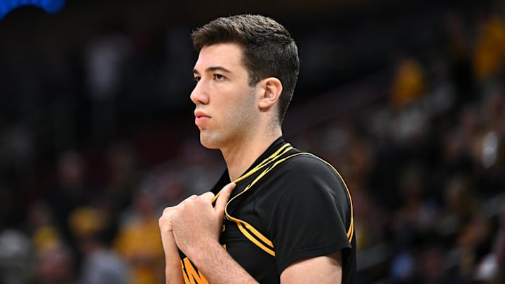 Mar 28, 2026; Houston, TX, USA; Iowa Hawkeyes forward Alvaro Folgueiras (7) warms up before an Elite Eight game of the South Regional of the men's 2026 NCAA Tournament against the Illinois Fighting Illini at Toyota Center. Mandatory Credit: Maria Lysaker-Imagn Images