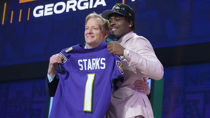 Apr 24, 2025; Green Bay, WI, USA; NFL commissioner Roger Goodell with Georgia Bulldogs safety Malaki Starks after he is selected by the Baltimore Ravens as the number 27 pick in the first round of the 2025 NFL Draft at Lambeau Field. Mandatory Credit: Kirby Lee-Imagn Images Apr 24, 2025; Green Bay, WI, USA; NFL commissioner Roger Goodell with Georgia Bulldogs safety Malaki Starks after he is selected by the Baltimore Ravens as the number 27 pick in the first round of the 2025 NFL Draft at Lambeau Field. Mandatory Credit: Kirby Lee-Imagn Images