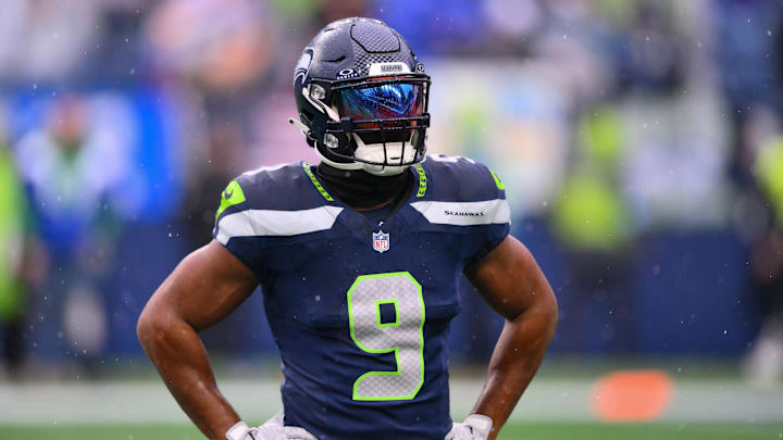 Dec 22, 2024; Seattle, Washington, USA; Seattle Seahawks running back Kenneth Walker III (9) during warmups before the game against the Minnesota Vikings at Lumen Field. Mandatory Credit: Steven Bisig-Imagn Images