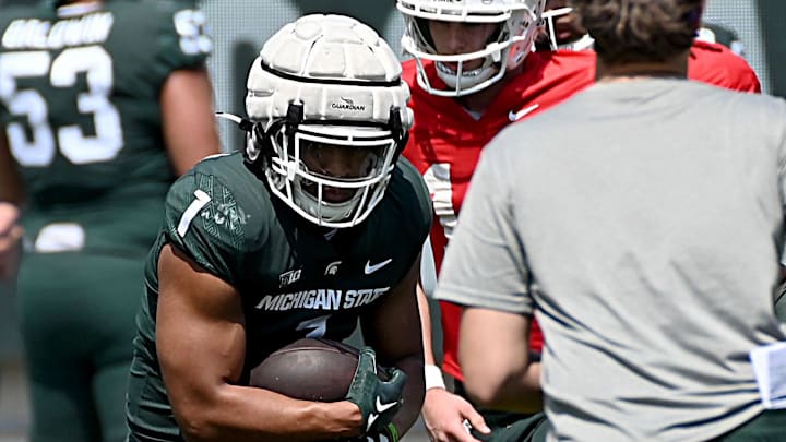 Apr 15, 2023; East Lansing, MI, USA; Michigan State Spartans running back Jaren Mangham runs Apr 15, 2023; East Lansing, MI, USA; Michigan State Spartans running back Jaren Mangham runs
