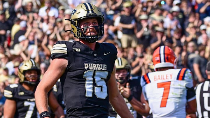 Purdue Boilermakers quarterback Ryan Browne (15) runs to celebrate a touchdown 