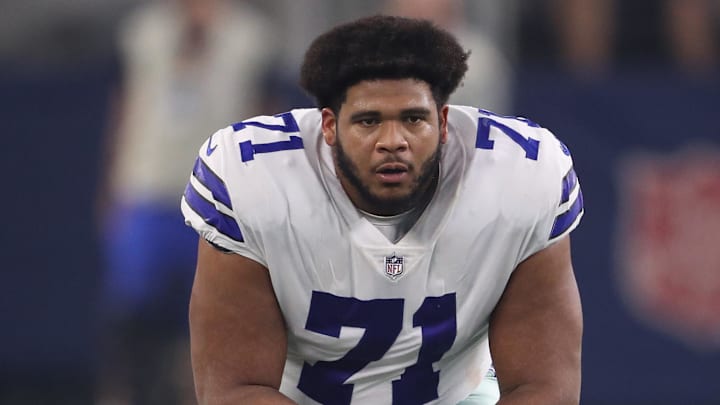 Sep 16, 2018; Arlington, TX, USA; Dallas Cowboys tackle La'el Collins (71) stretches without his