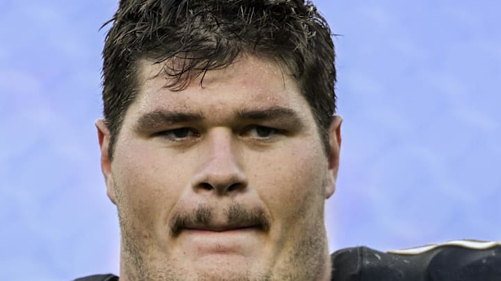 Oct 26, 2025; Baltimore, Maryland, USA;  Baltimore Ravens center Tyler Linderbaum (64) on the field after the game against the Chicago Bears at M&T Bank Stadium. Mandatory Credit: Tommy Gilligan-Imagn Images