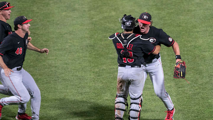 Georgia's Leighton Finley (12) celebrates the Bulldogs 13-11 win over Florida, Friday, April 14,