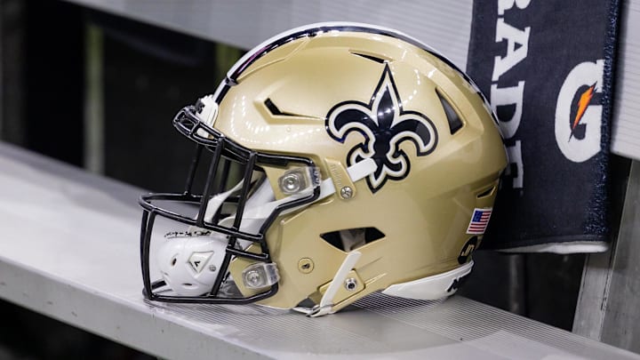Nov 5, 2023; New Orleans, Louisiana, USA;  Detailed view of the New Orleans Saints helmet on the team bench against the Chicago Bears during the first half at the Caesars Superdome. Mandatory Credit: Stephen Lew-Imagn Images