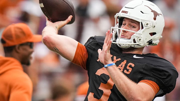 Texas Longhorns quarterback Quinn Ewers (3) throws a pass while warming up ahead of the Longhorns' spring Orange and White game at Darrell K Royal Texas Memorial Stadium in Austin, Texas, April 20, 2024.