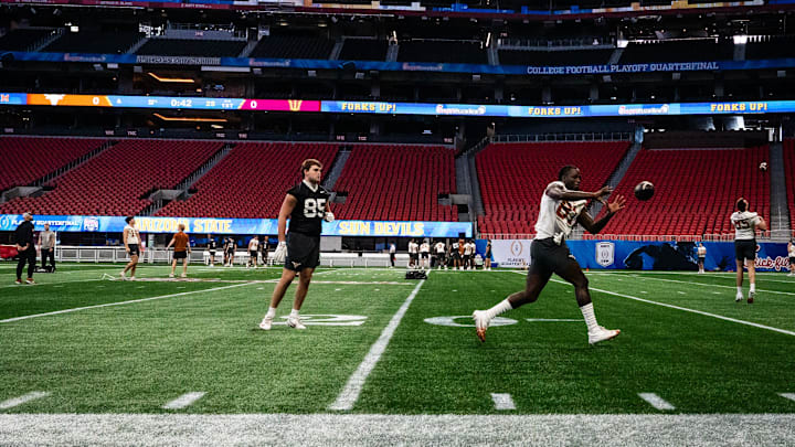 The Texas Longhorns practice at Mercedes-Benz Stadium in Atlanta, Georgia on Dec. 30, 2024 ahead of the College Football Playoff Quarterfinals. The Longhorns will play the Arizona State Sun Devils in the Peach Bowl on New Years Day.