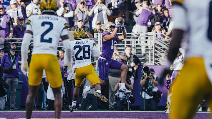 Denzel Boston makes a touchdown catch against Michigan. Denzel Boston makes a touchdown catch against Michigan.