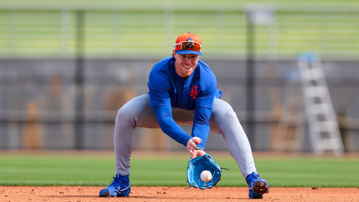Feb 19, 2025; Port St. Lucie, FL, USA; New York Mets infielder Brett Baty (7) catches a baseball during a spring training workout at Clover Park. Feb 19, 2025; Port St. Lucie, FL, USA; New York Mets infielder Brett Baty (7) catches a baseball during a spring training workout at Clover Park.