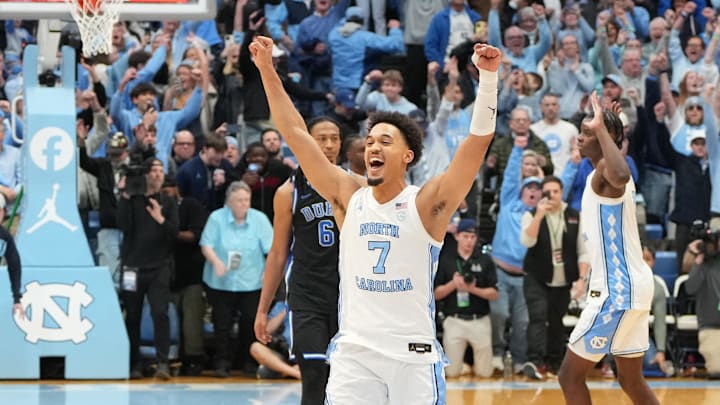 Feb 7, 2026; Chapel Hill, North Carolina, USA; UNC guard Seth Trimble (7) celebrates with teammates after the game at Dean E. Smith Center.
