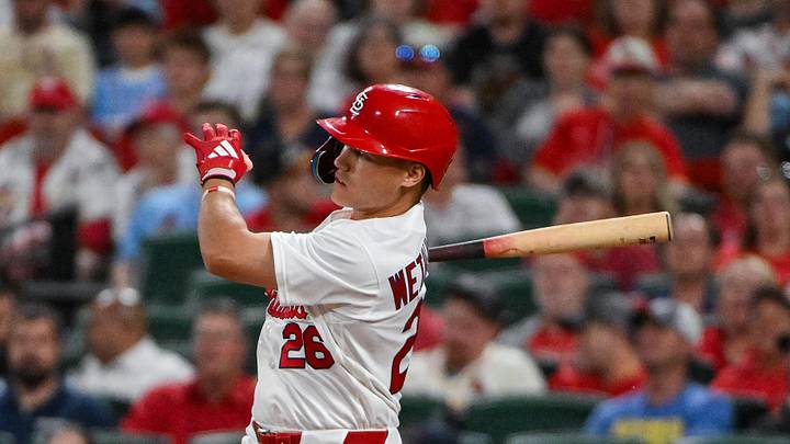 May 4, 2026; St. Louis, Missouri, USA; St. Louis Cardinals second baseman JJ Wetherholt (26) hits a one run single against the Milwaukee Brewers during the eighth inning at Busch Stadium. Mandatory Credit: Jeff Curry-Imagn Images
