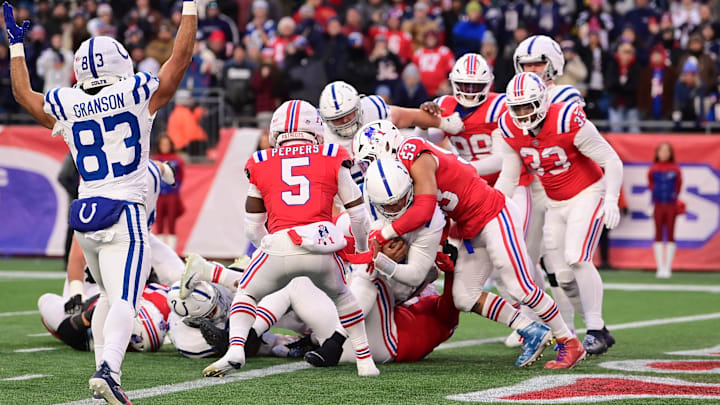 Dec 1, 2024; Foxborough, Massachusetts, USA; Indianapolis Colts quarterback Anthony Richardson (5) scores on a two point conversion against the New England Patriots during the second half at Gillette Stadium. Mandatory Credit: Eric Canha-Imagn Images