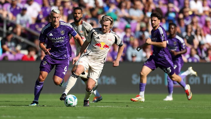 Apr 12, 2025; Orlando, Florida, USA; New York Red Bulls midfielder Emil Forsberg (10) controls the ball against Orlando City in the first half at Inter&Co Stadium. Mandatory Credit: Nathan Ray Seebeck-Imagn Images