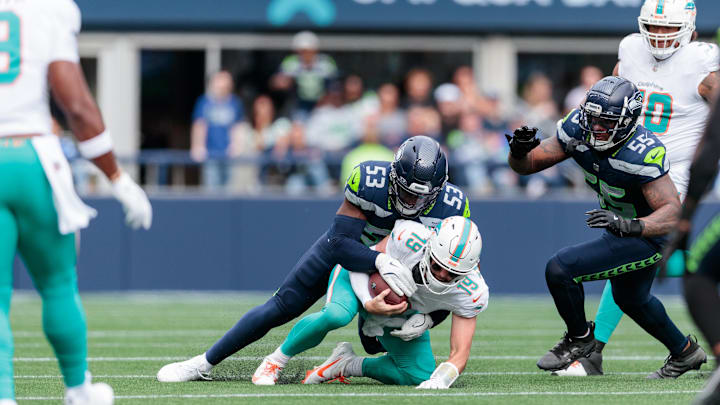 Sep 22, 2024; Seattle, Washington, USA; Seattle Seahawks linebacker Boye Mafe (53) sacks Miami Dolphins quarterback Skylar Thompson (19) during the second quarter at Lumen Field.